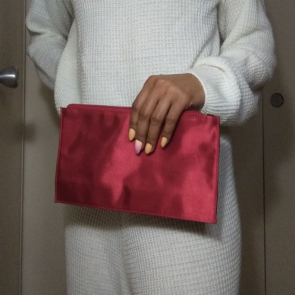 Clinique red  clutch/ make up bag
